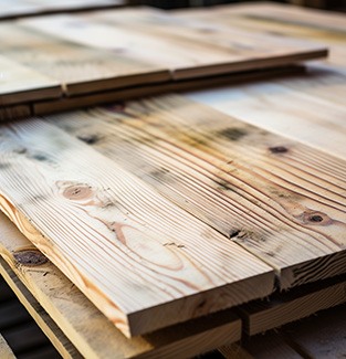 Stacked wooden floorboards
