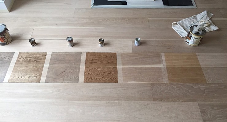 Sample board of hardwood floor paints in various opacities