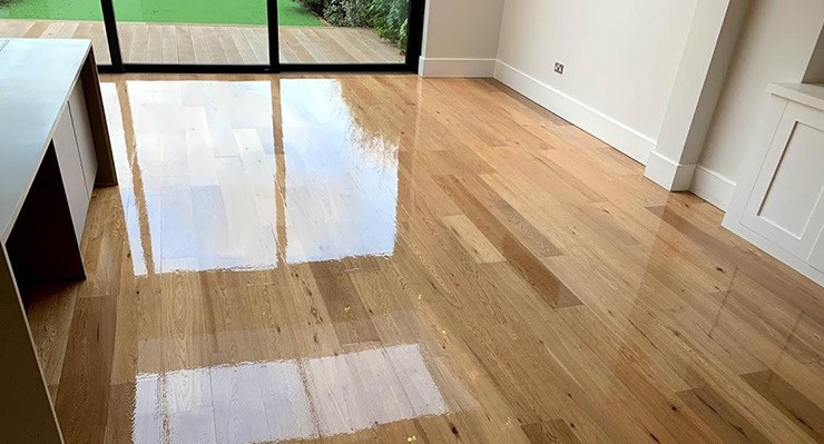 Freshly sanded wood floor in a big room